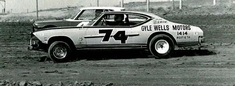 Gayle Wells Special nose to nose on the last lap against one of the Moore's in the next to last turn